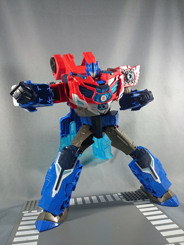 TAV 50 Hypersurge Optimus Prime Transformers Adventure Figure In Hand Photos 03 (3 of 13)